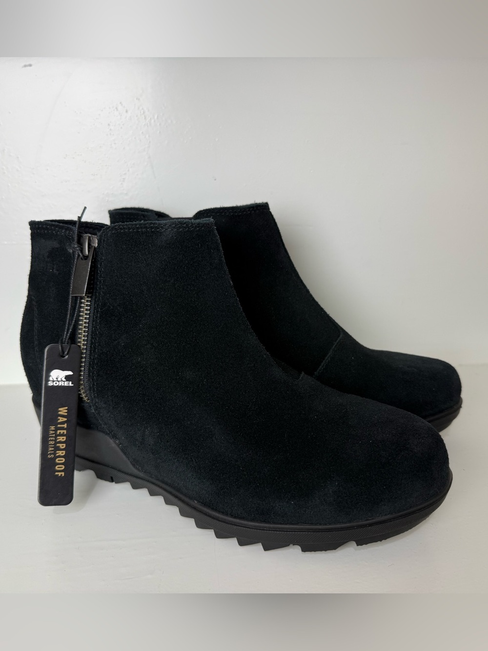 Sorel Evie Zip Waterproof Wedge Ankle Boots in black suede